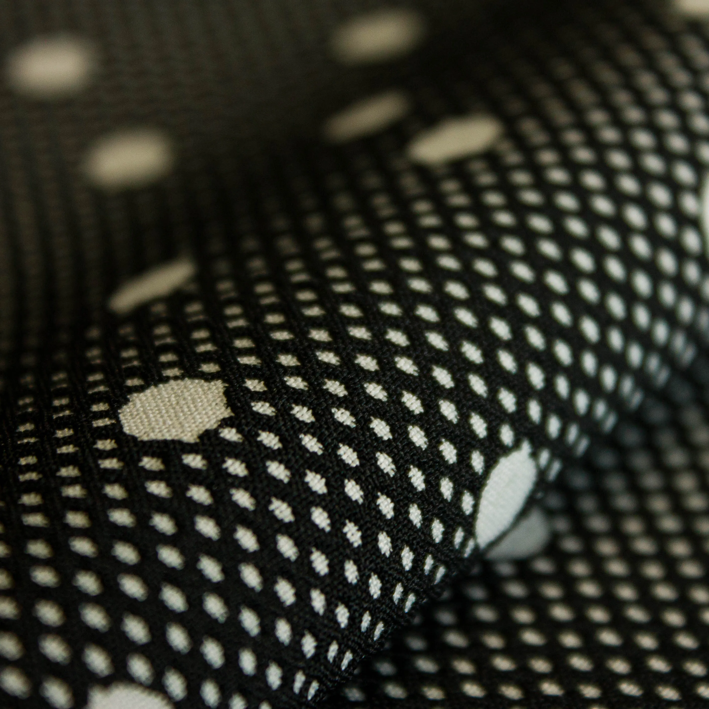 Jacquard polyester zwart / grijs met bollen